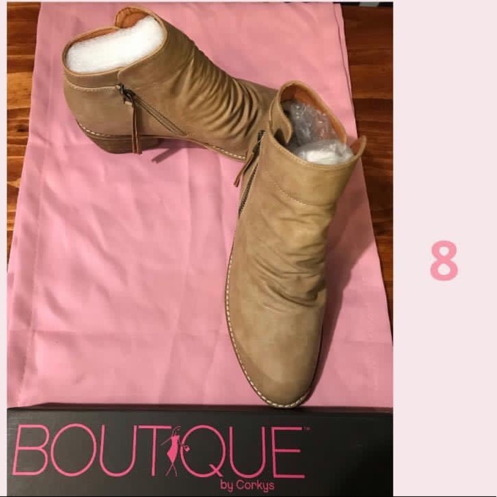 Corky’s tan boots